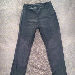 Mesh snakeskin leggings.